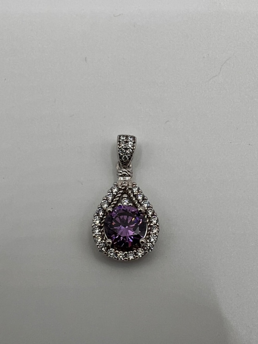 White Gold amethyst pendant with diamond-style halo